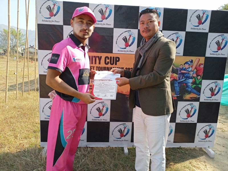Hem of Dimapur Slammers CC receiving the man of the match award on January 28.